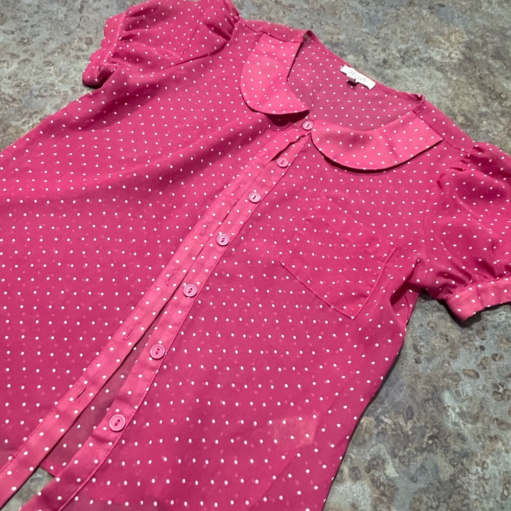 Delia’s pink polka dot blouse